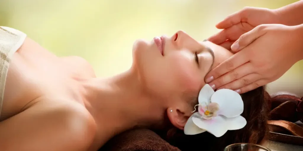 Hands Massaging A Person'S Head